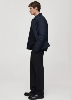 MANGO Spodnie*Spodnie regular fit z lejącej tkaniny z zaszewkami